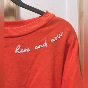 Coral crop sweatshirt.